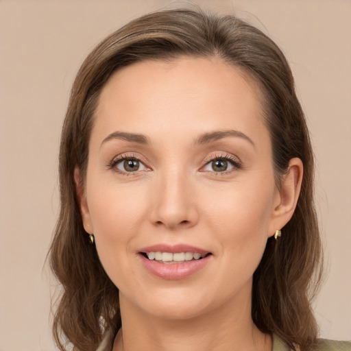 Joyful white young-adult female with medium  brown hair and brown eyes