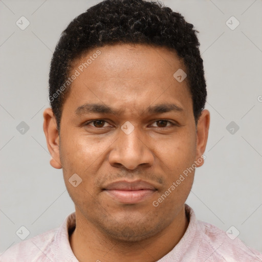 Joyful latino adult male with short  brown hair and brown eyes