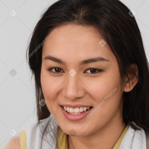 Joyful latino young-adult female with medium  brown hair and brown eyes