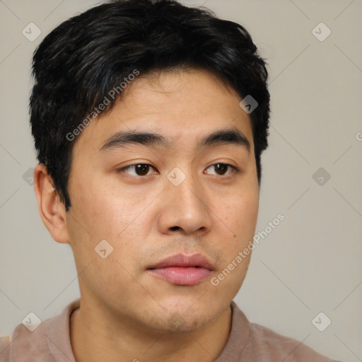 Neutral white young-adult male with short  black hair and brown eyes