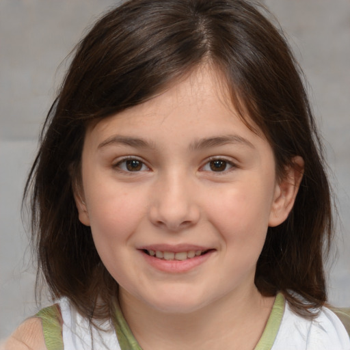 Joyful white child female with medium  brown hair and brown eyes