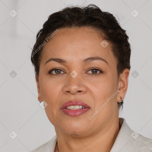 Joyful white adult female with short  brown hair and brown eyes