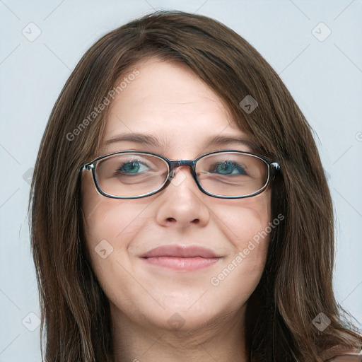 Joyful white young-adult female with long  brown hair and blue eyes