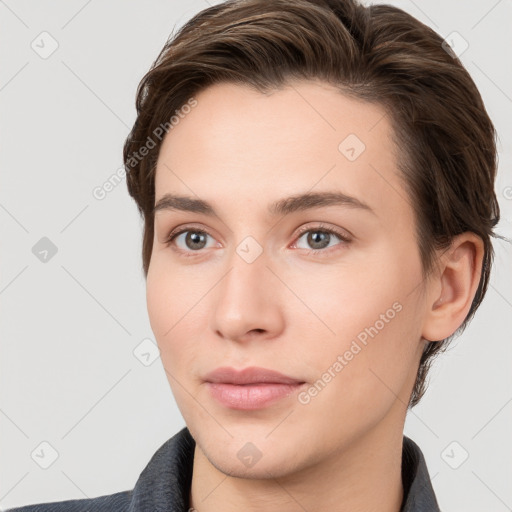 Neutral white young-adult female with short  brown hair and brown eyes