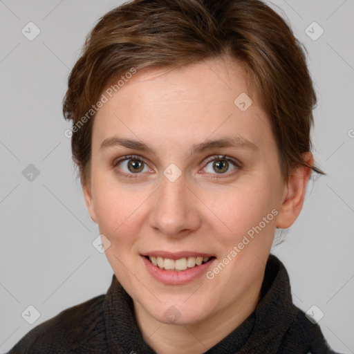 Joyful white young-adult female with medium  brown hair and grey eyes