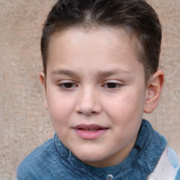 Joyful white child female with short  brown hair and blue eyes