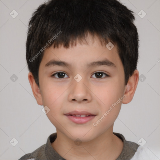 Joyful white child male with short  brown hair and brown eyes