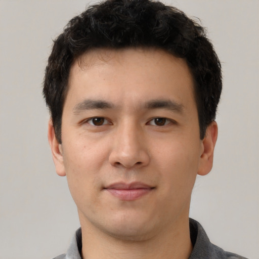 Neutral white young-adult male with short  black hair and brown eyes