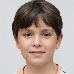 Joyful white child female with short  brown hair and brown eyes