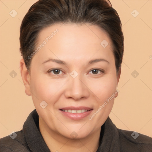 Joyful white adult female with short  brown hair and brown eyes