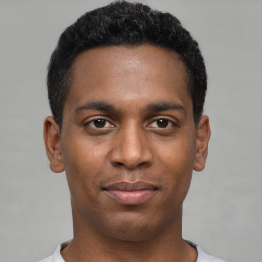 Neutral black young-adult male with short  black hair and brown eyes