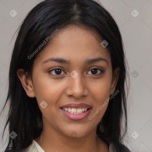 Joyful latino young-adult female with long  brown hair and brown eyes