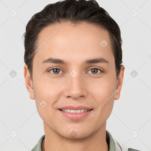 Joyful white young-adult male with short  brown hair and brown eyes