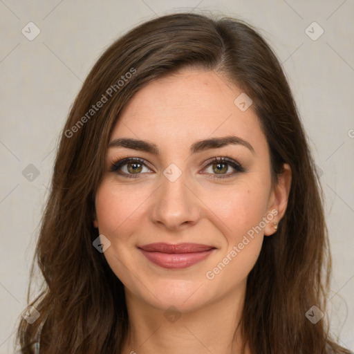 Joyful white young-adult female with long  brown hair and green eyes