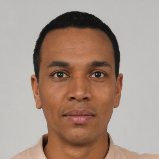Neutral black young-adult male with short  black hair and brown eyes