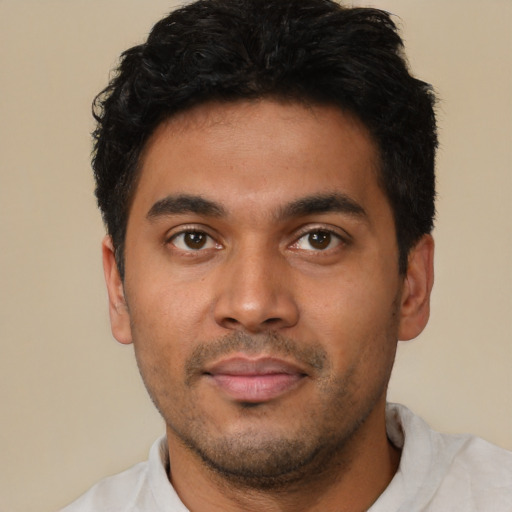 Neutral latino young-adult male with short  brown hair and brown eyes