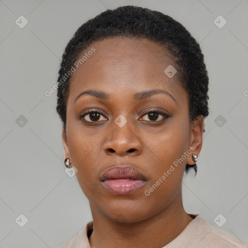 Neutral black young-adult female with short  black hair and brown eyes
