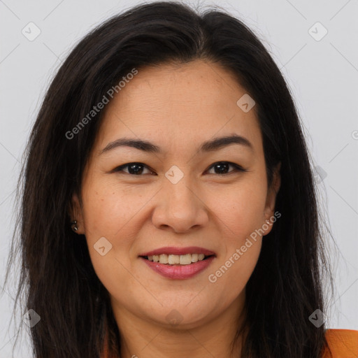 Joyful asian young-adult female with long  brown hair and brown eyes