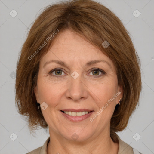 Joyful white adult female with medium  brown hair and brown eyes