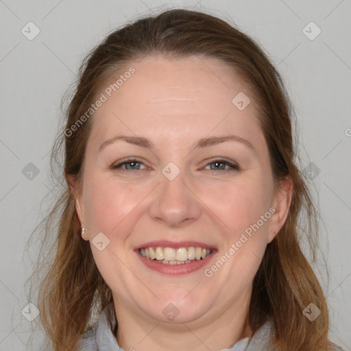 Joyful white adult female with medium  brown hair and grey eyes