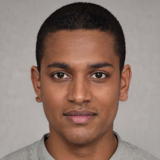 Neutral black young-adult male with short  black hair and brown eyes