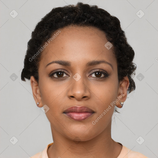 Joyful black young-adult female with short  brown hair and brown eyes