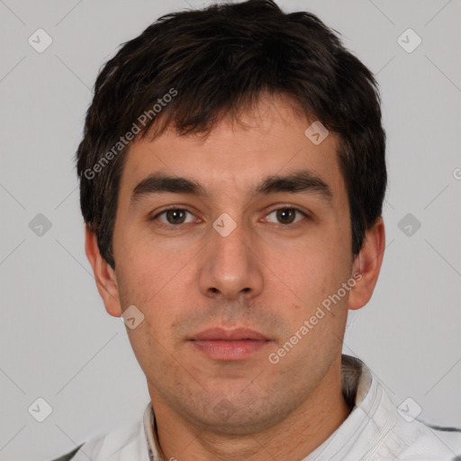 Neutral white young-adult male with short  brown hair and brown eyes