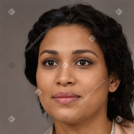 Joyful latino young-adult female with long  brown hair and brown eyes