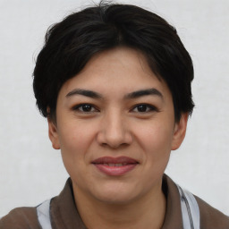 Joyful asian young-adult female with short  black hair and brown eyes