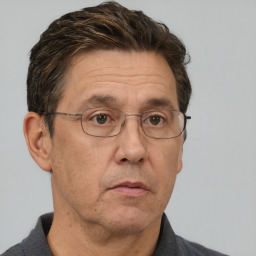 Neutral white middle-aged male with short  brown hair and brown eyes