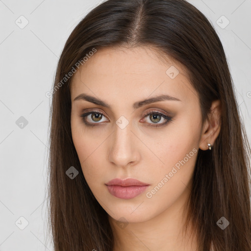 Neutral white young-adult female with long  brown hair and brown eyes