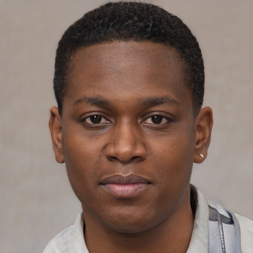 Neutral black young-adult male with short  brown hair and brown eyes