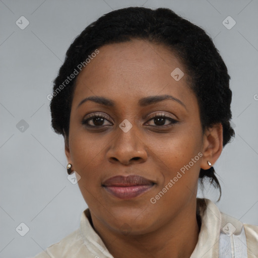 Joyful latino adult female with medium  black hair and brown eyes