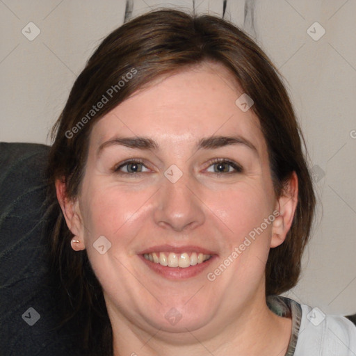 Joyful white young-adult female with medium  brown hair and blue eyes