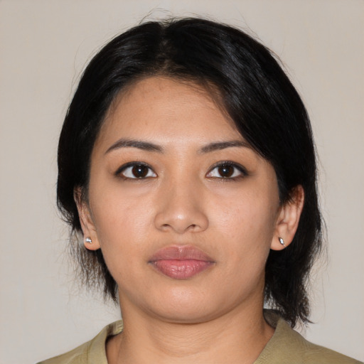 Neutral asian young-adult female with medium  black hair and brown eyes