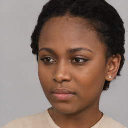 Neutral black young-adult female with short  black hair and brown eyes