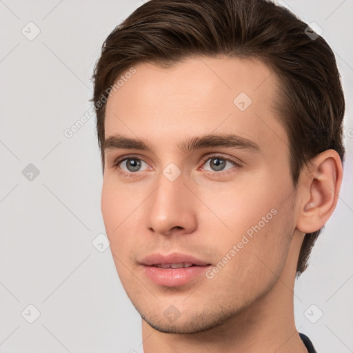 Neutral white young-adult male with short  brown hair and brown eyes