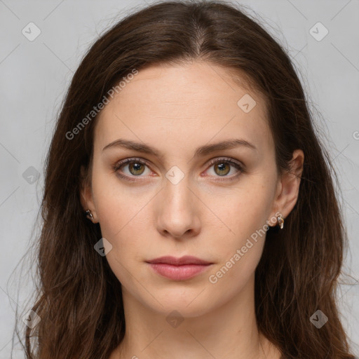 Neutral white young-adult female with long  brown hair and brown eyes