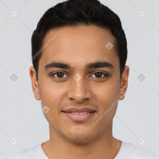 Joyful latino young-adult male with short  brown hair and brown eyes