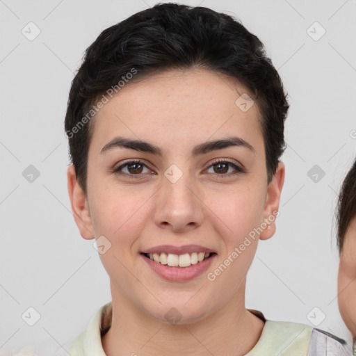 Joyful white young-adult female with short  brown hair and brown eyes