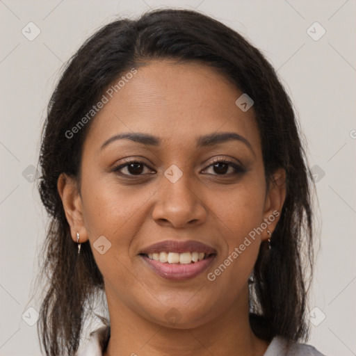 Joyful latino young-adult female with medium  brown hair and brown eyes