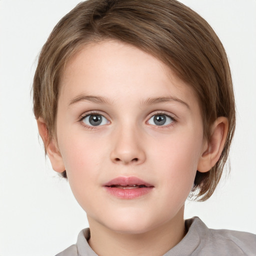 Joyful white child female with medium  brown hair and blue eyes