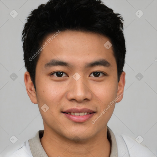 Joyful asian young-adult male with short  black hair and brown eyes