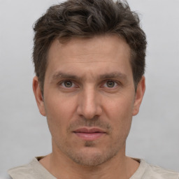 Neutral white adult male with short  brown hair and brown eyes