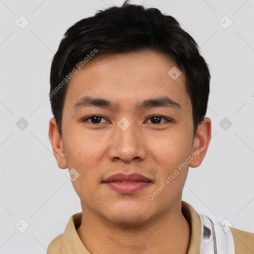 Joyful asian young-adult male with short  black hair and brown eyes