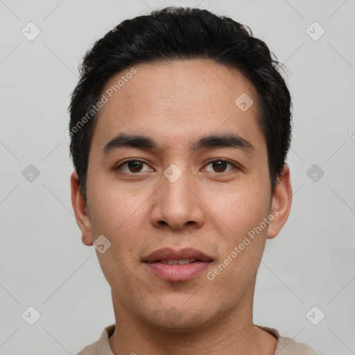 Joyful white young-adult male with short  black hair and brown eyes