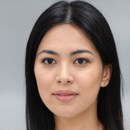 Joyful asian young-adult female with long  black hair and brown eyes