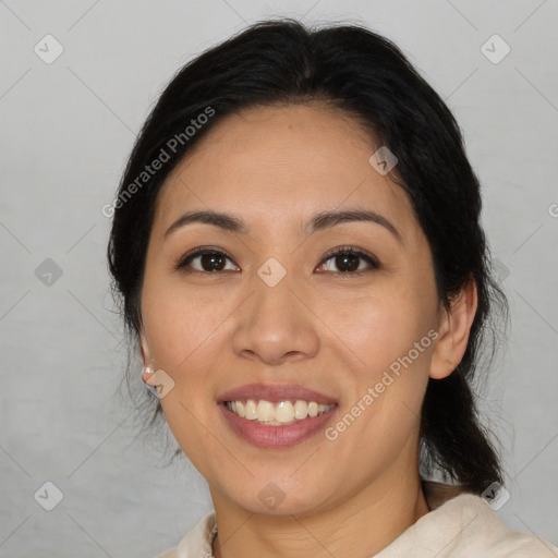 Joyful asian young-adult female with medium  brown hair and brown eyes