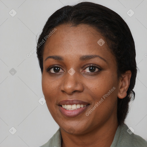 Joyful black young-adult female with medium  black hair and brown eyes