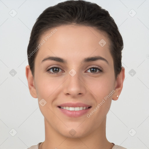 Joyful white young-adult female with short  brown hair and brown eyes